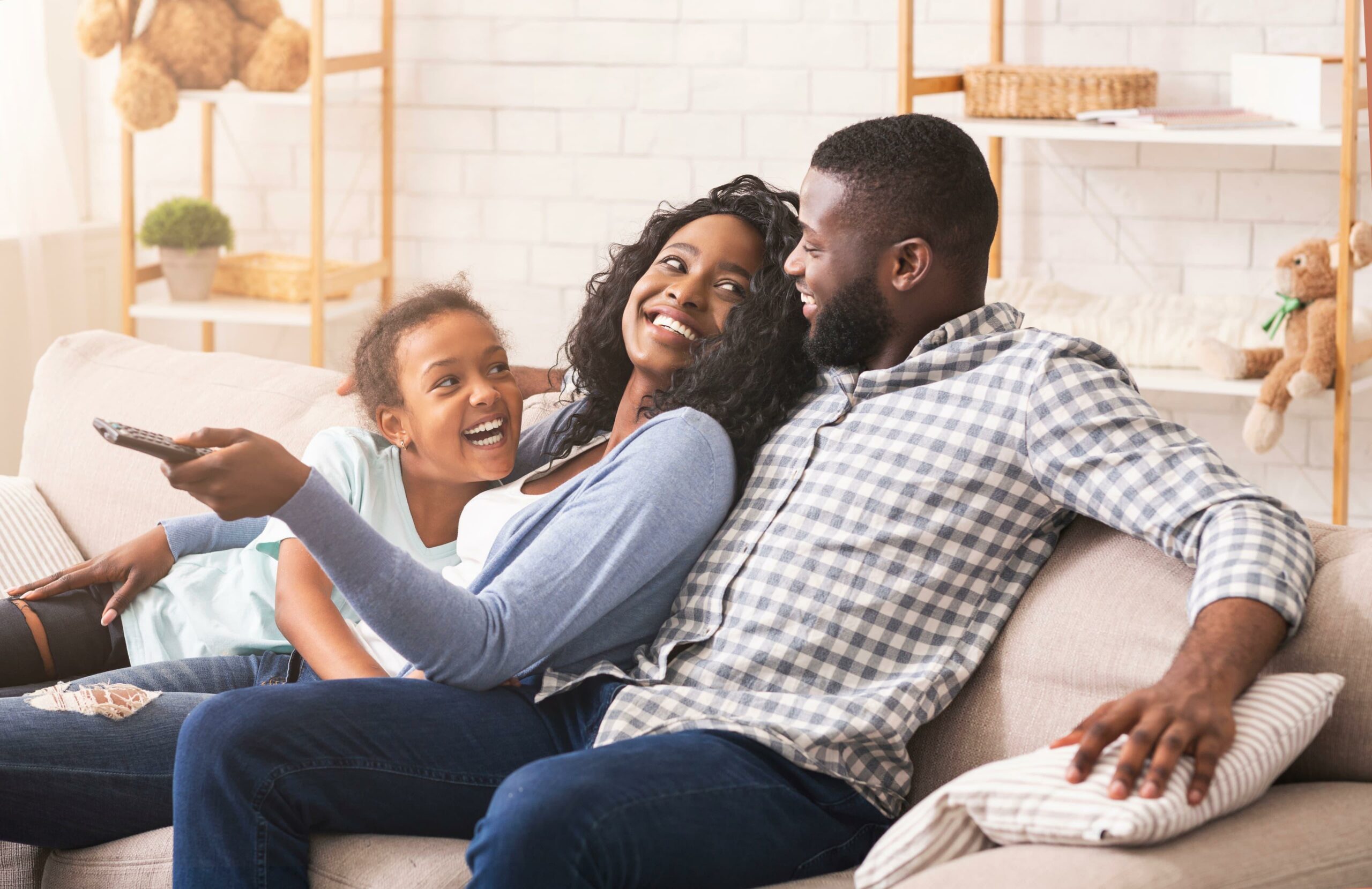 Family sitting in couch