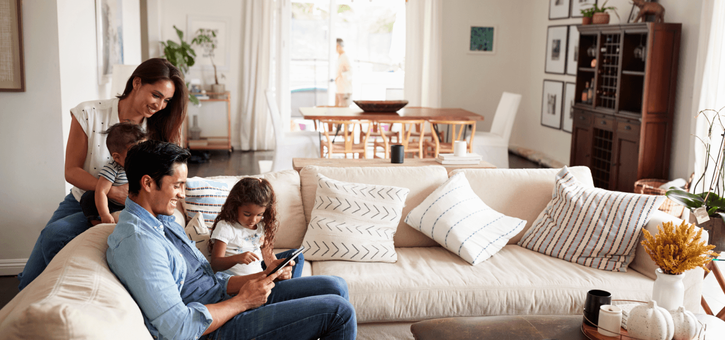 Family sitting at the sofa